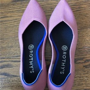 Pink pointed toe Rothy flats.